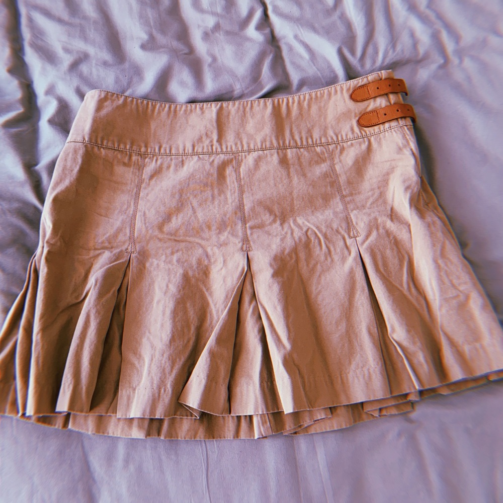tan khaki skirt with accent buckles on side
